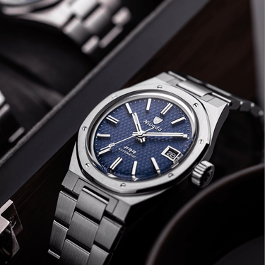 F77 Blue With Date - Nivada Grenchen